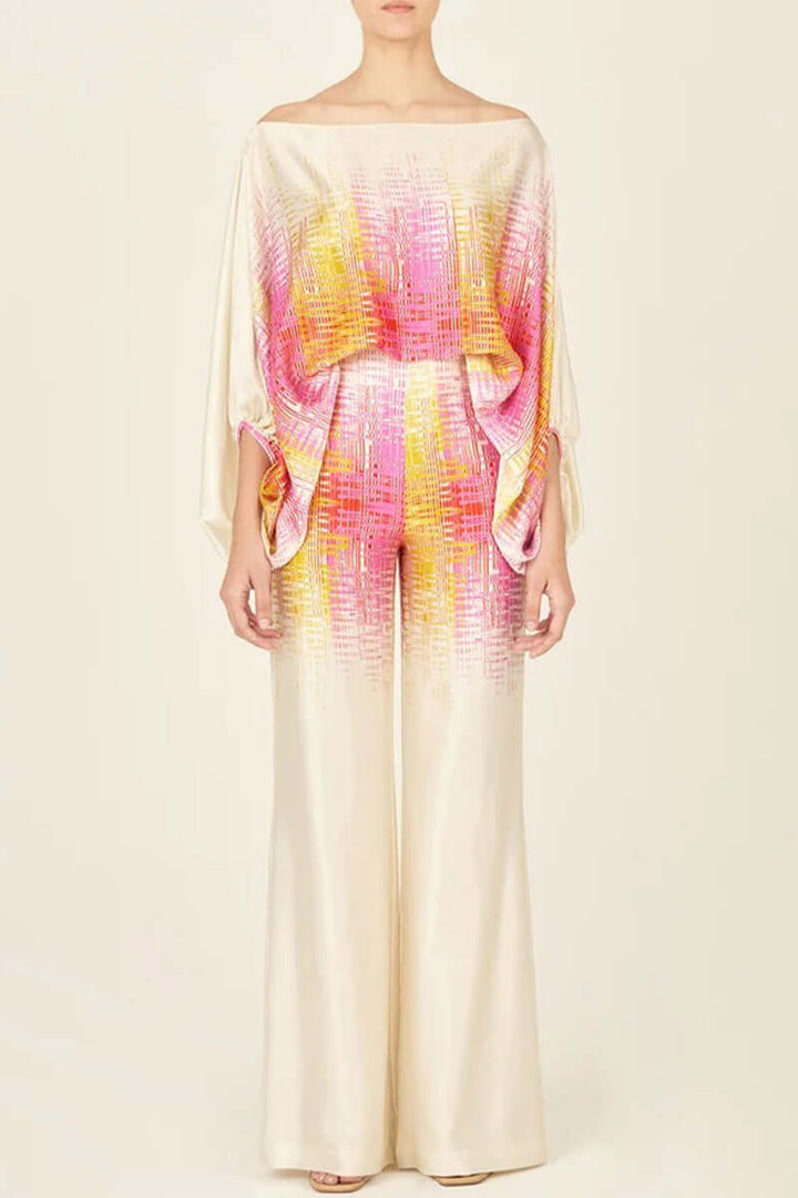 Party-ready women's off-shoulder long sleeve printed skirt & top set.