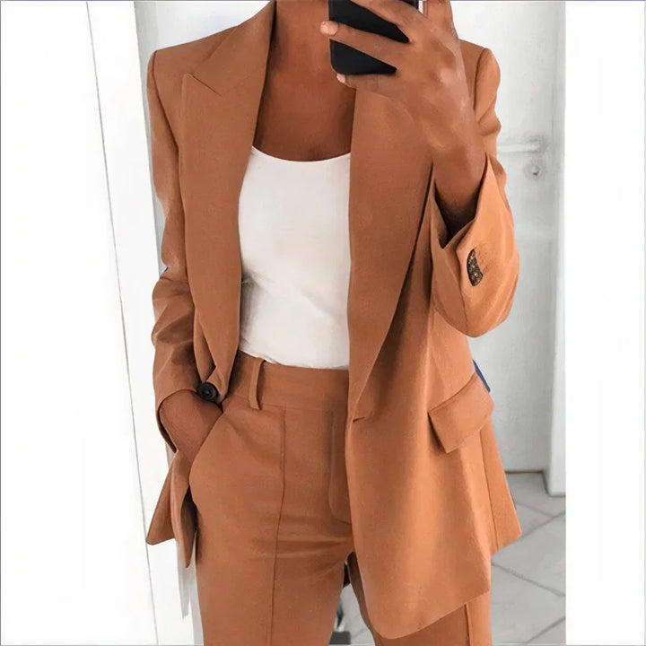 Elegant women's matching set: tailored blazer & comfortable high-waisted pants for professional and casual wear.