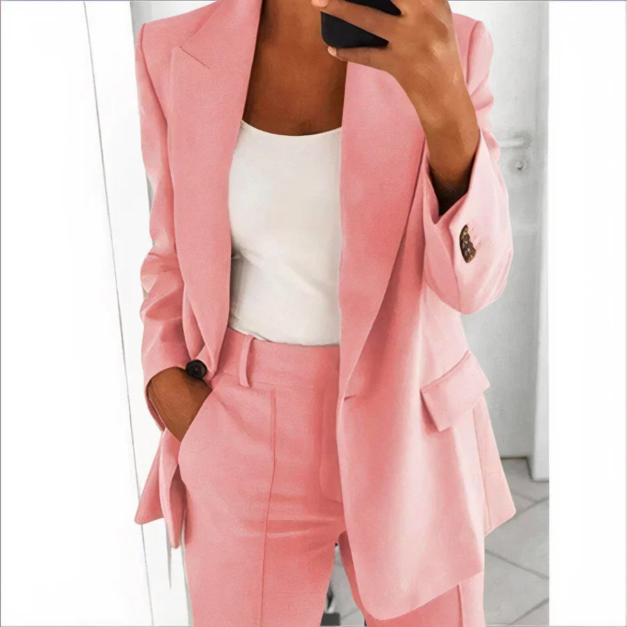 New women's fashion: tailored blazer & high-waisted pants two-piece set. Modern professional elegance for women.