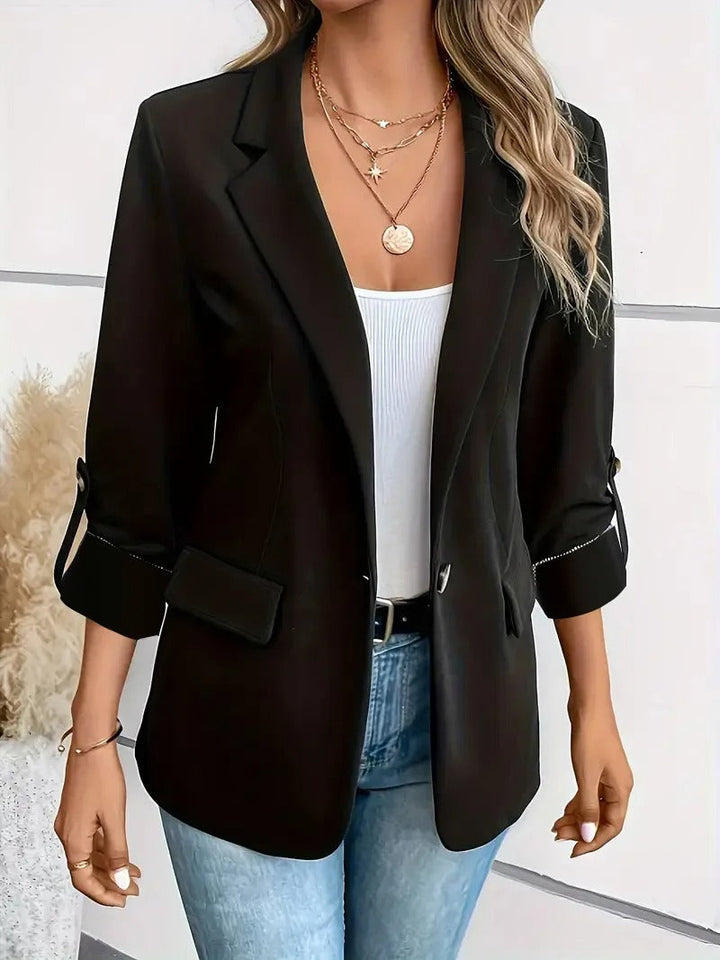 Elegant tailored women's single-breasted blazer, ideal for formal wear, work, or smart casual outfits.
