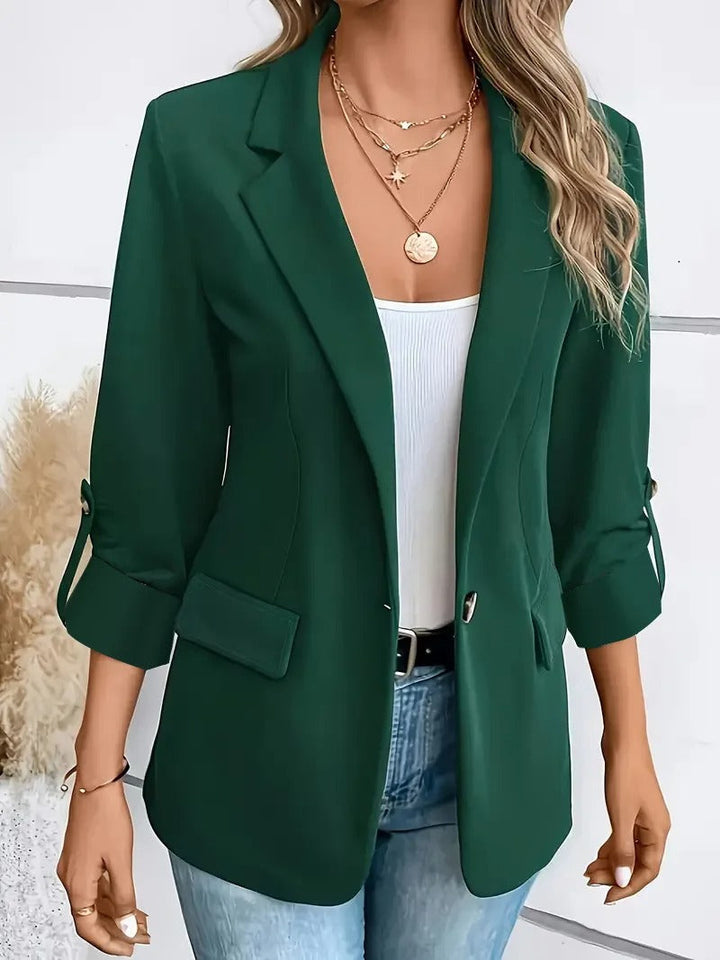 Sleek women's single-breasted blazer for professional business attire & sophisticated office style.