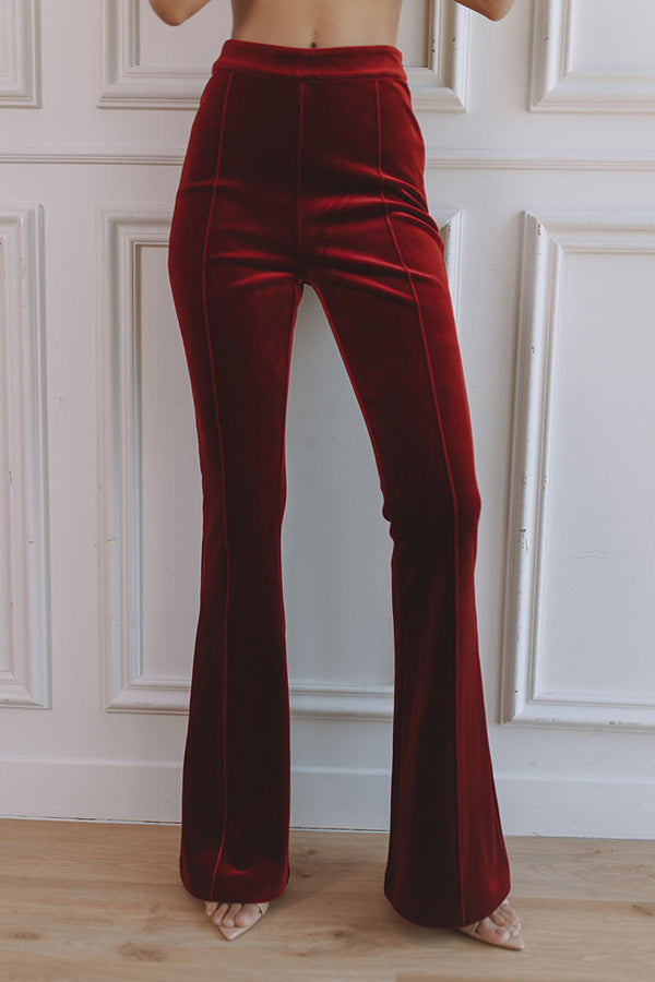 Elegant women's workwear suit: a sharp blazer paired with fashionable flare trousers, suitable for formal occasions.