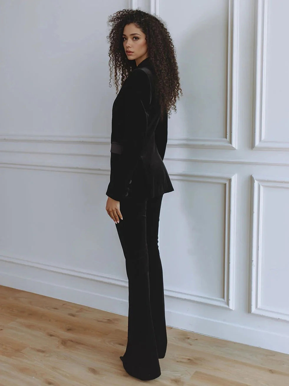 Tailored women's blazer and flare trouser co-ord set, a sophisticated two-piece workwear ensemble for women.