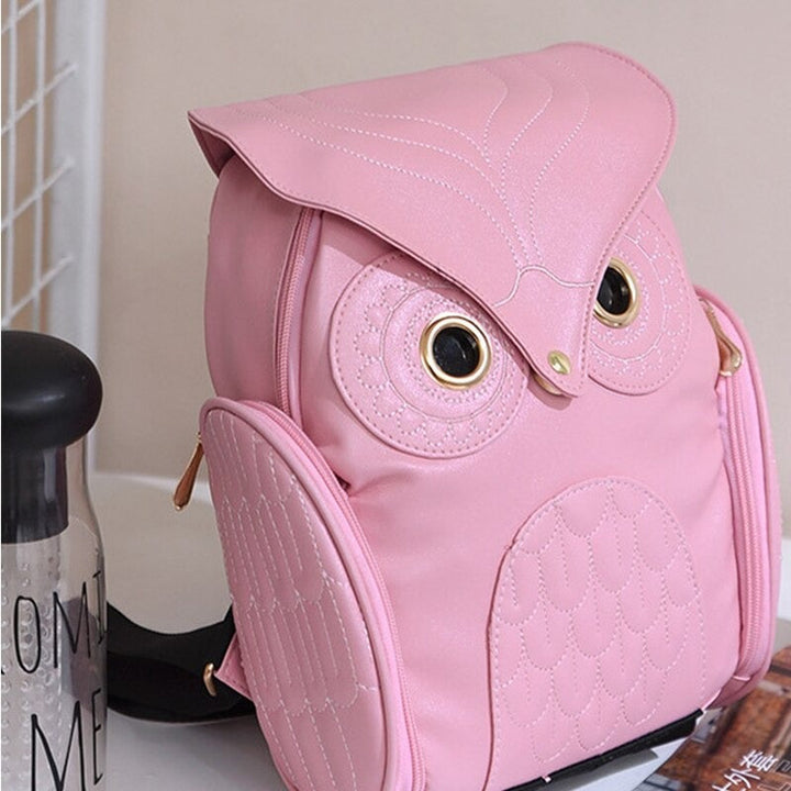 Full view: Stylish women's PU leather owl print backpack with multiple pockets, perfect for travel.