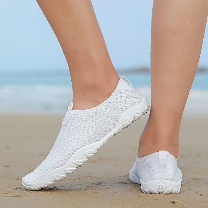 Comfortable women's water shoes for beach & swim, quick-dry, anti-slip, perfect breathable aquatic footwear.