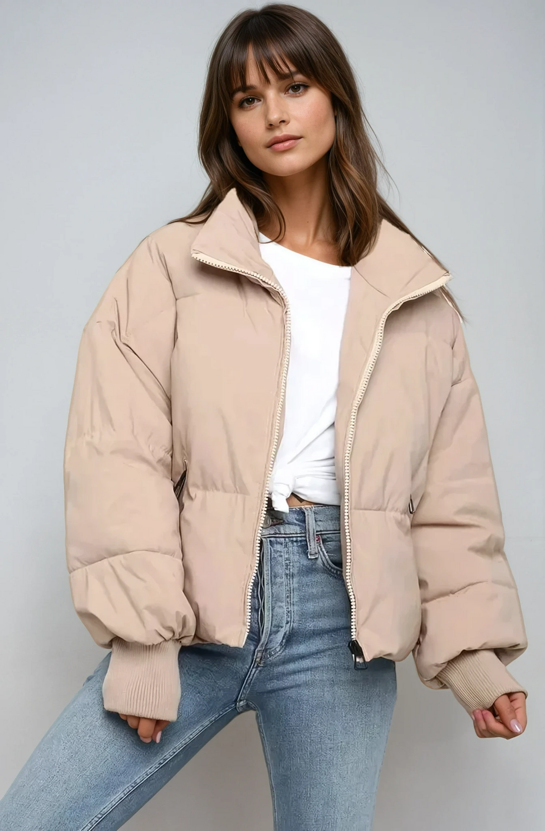 Women's quilted puffer jacket in a stylish color, perfect for warm, cozy cold-weather everyday wear.