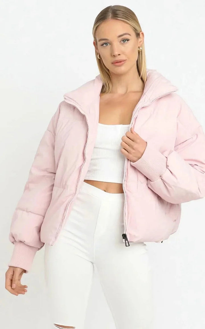 Warm & cozy women's quilted puffer jacket. Stylish outerwear for cold weather, perfect for everyday casual wear.