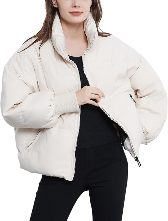 Quilted design women's puffer jacket. Stylish, warm winter coat for cold weather casual fashion.