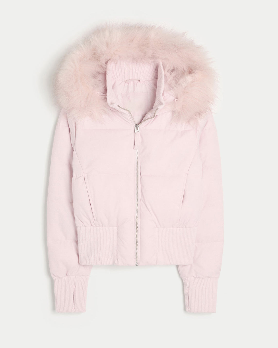 Modern women's quilted winter jacket, designed for warmth with a sleek finish and a functional removable hood.