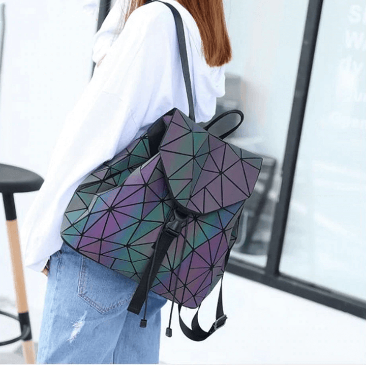 Fashion-forward women's reflective geometric backpack, dazzling color-changing effect, a versatile accessory.
