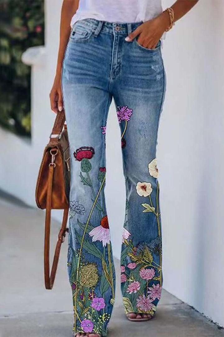 Women's regular fit jeans with elegant floral embroidery, perfect for casual style.