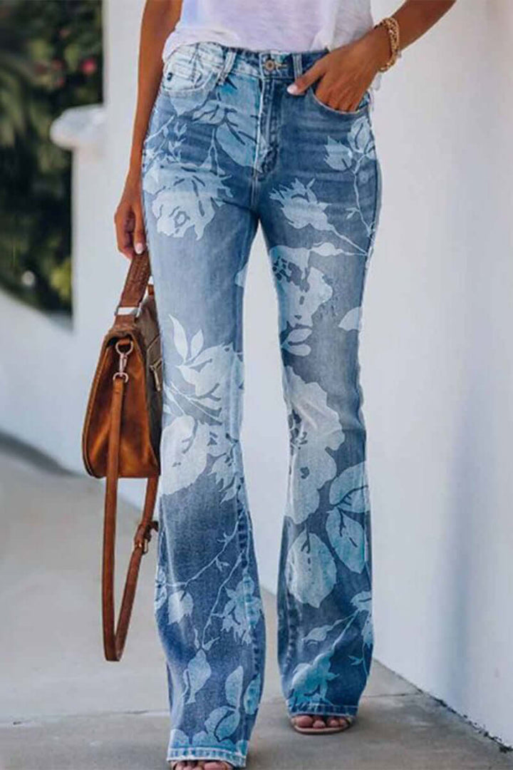 Embroidered women's regular fit jeans, showcasing vibrant floral patterns on denim.