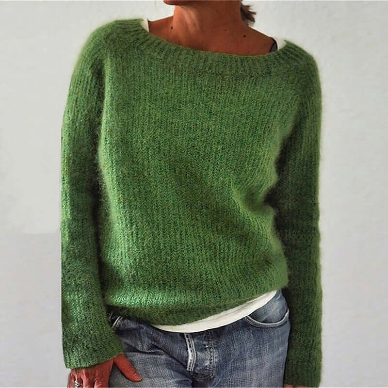 Versatile women's relaxed acrylic knit sweater, a cozy fall essential. Perfect comfortable top for winter fashion.