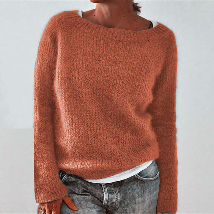 Effortlessly comfortable women's relaxed fit acrylic knit sweater. A cozy pullover ideal for chic casual wear.