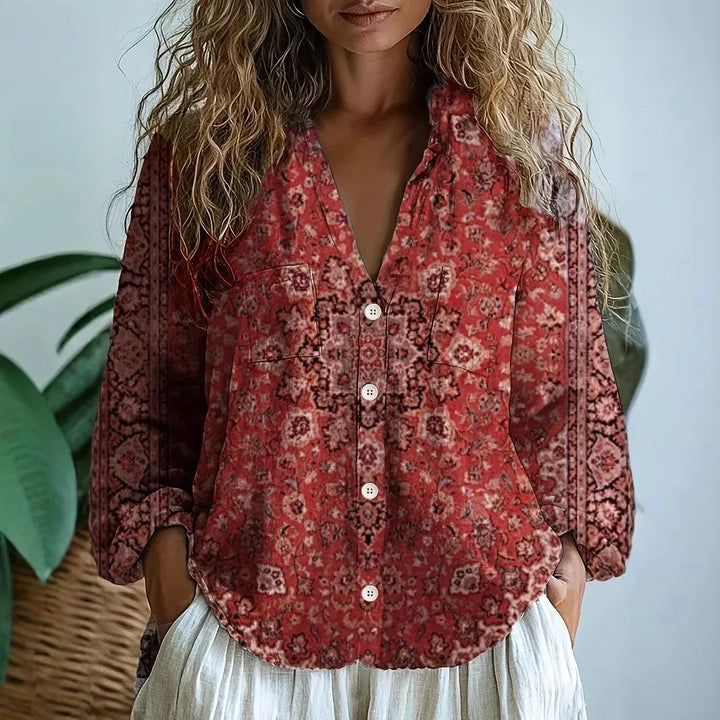 Stylish women's long-sleeve blouse, featuring a beautiful nature print and a comfortable relaxed fit.