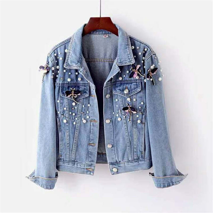 Women's relaxed fit blue denim jacket, perfect for casual wear & comfortable layering.