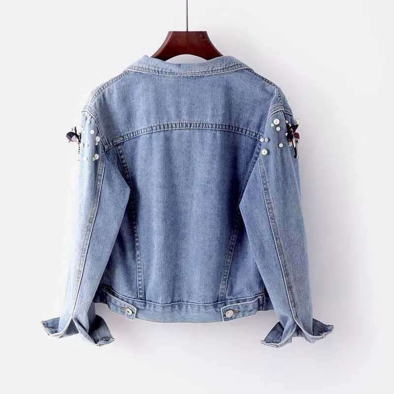 Effortless style with a women's cotton denim jacket in a relaxed fit. Timeless fashion outerwear.