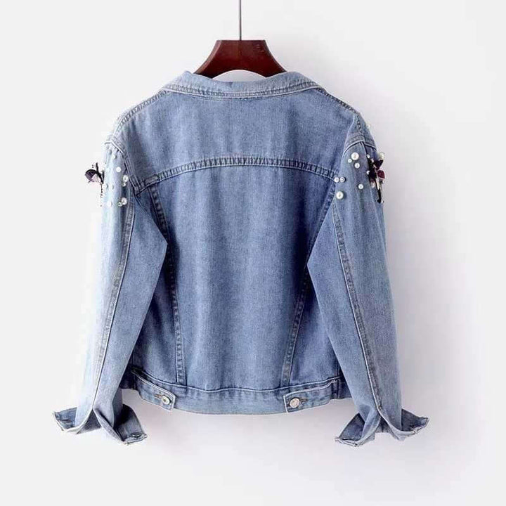 Effortless style with a women's cotton denim jacket in a relaxed fit. Timeless fashion outerwear.