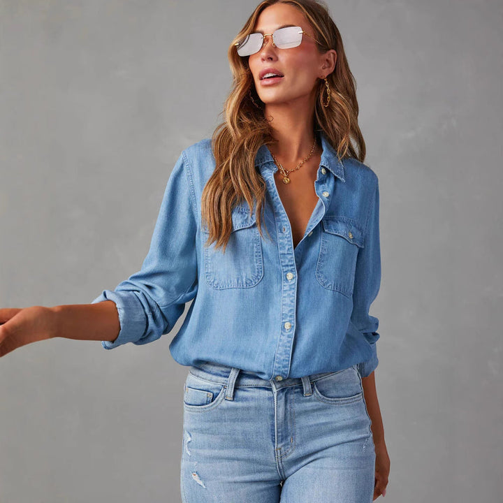 Versatile women's blue denim shirt, relaxed long sleeve button-down. Effortless casual everyday wear top.