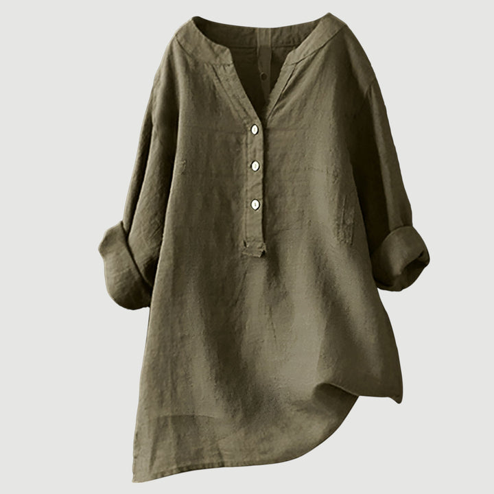 Ladies relaxed fit flowy button tunic top, comfortable and versatile for everyday fashion.