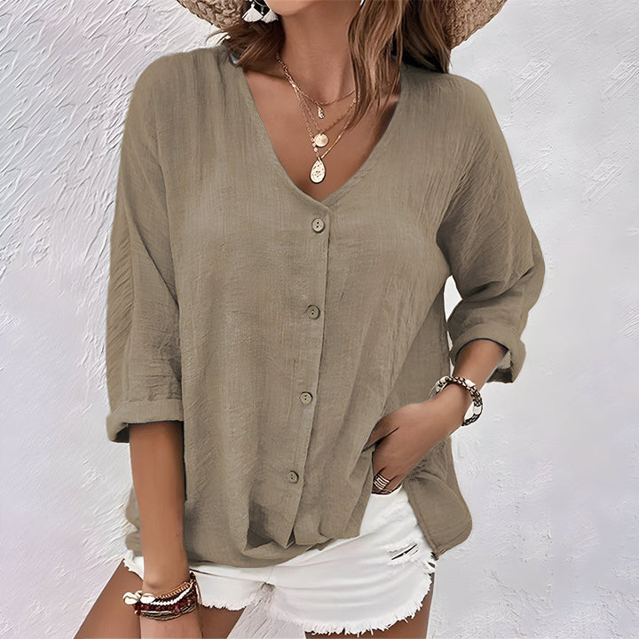 Comfortable women's relaxed fit button-up top, an elegant choice for versatile everyday wear & ladies apparel.