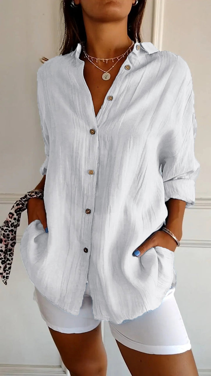 Women's comfortable long sleeve button-up shirt, relaxed fit, perfect for versatile everyday and workwear styles.