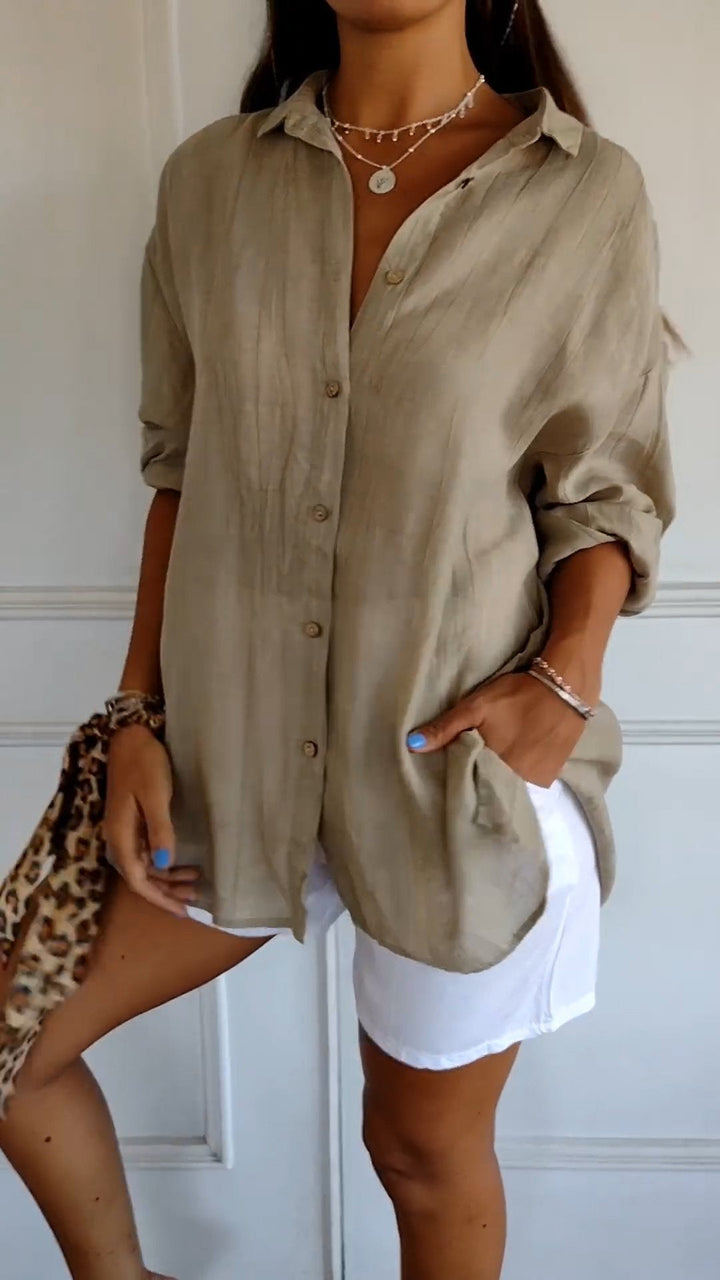 Chic women's button-up long sleeve shirt, relaxed fit, perfect for smart casual workwear.