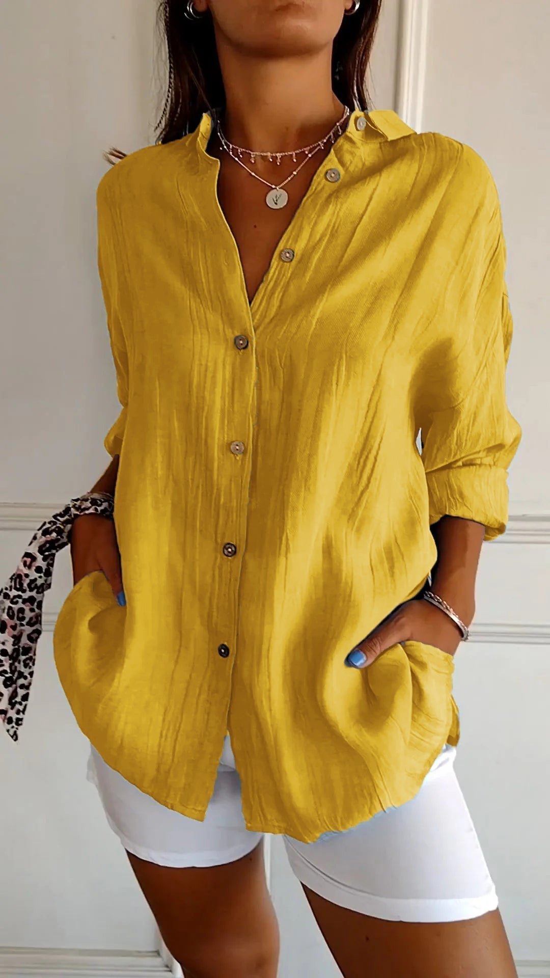 Colorful women's relaxed fit button-up long sleeve shirt, a vibrant casual top for all occasions.