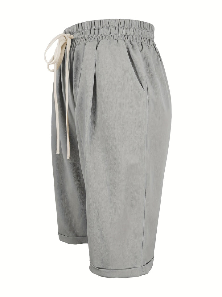Woman walking in comfortable relaxed fit capri pants, showing flexibility for everyday & travel.