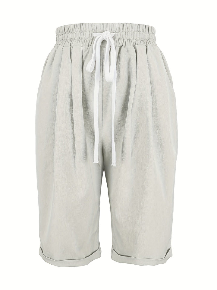 Back view of ladies' relaxed fit capri pants, comfortable for everyday wear, flattering mid-calf design.