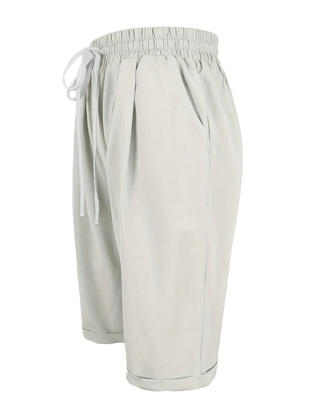 Women's relaxed fit capri pants styled casually for summer, a comfortable and fashionable everyday look.