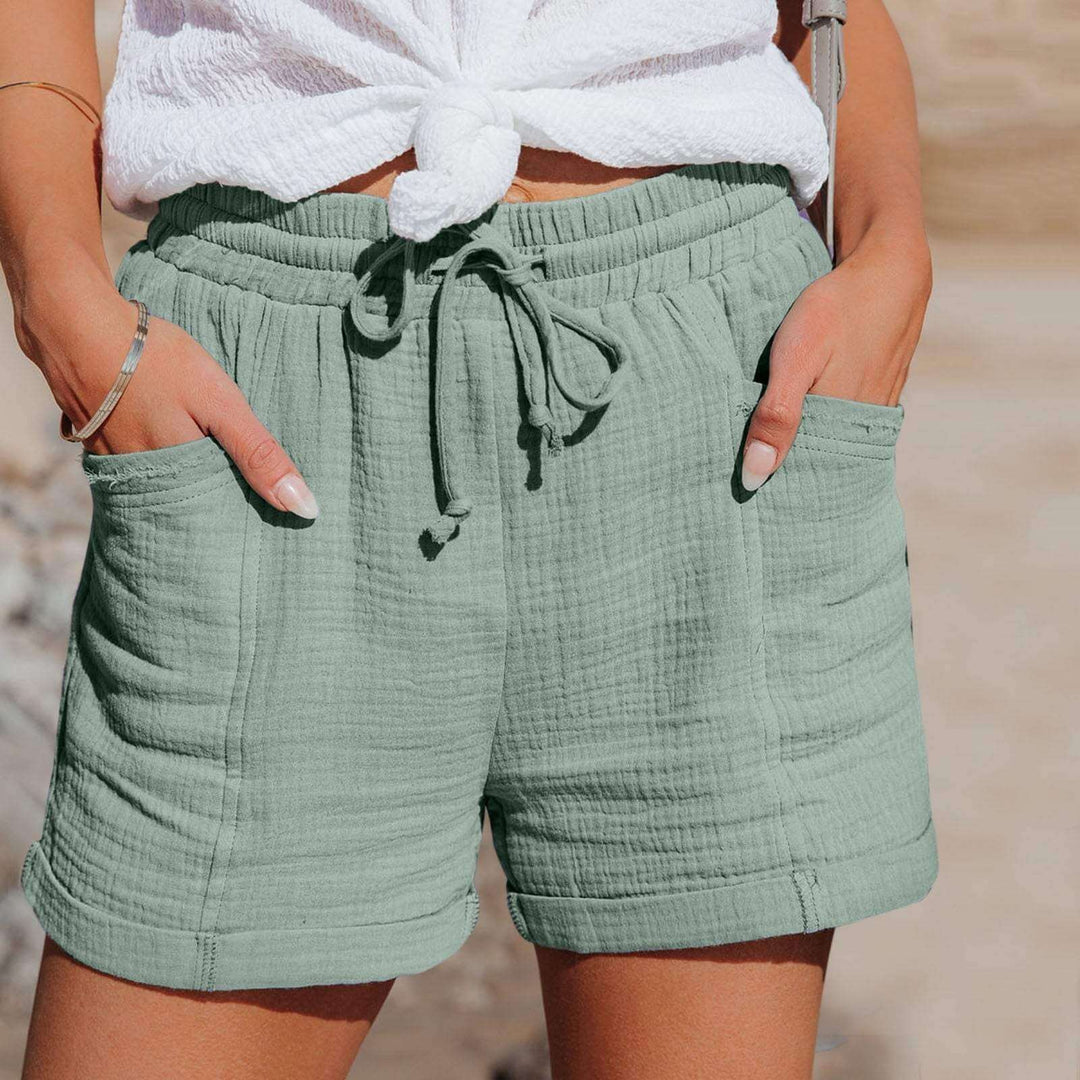 Women's relaxed fit casual shorts for ultimate summer comfort. Breathable, elastic waist design.