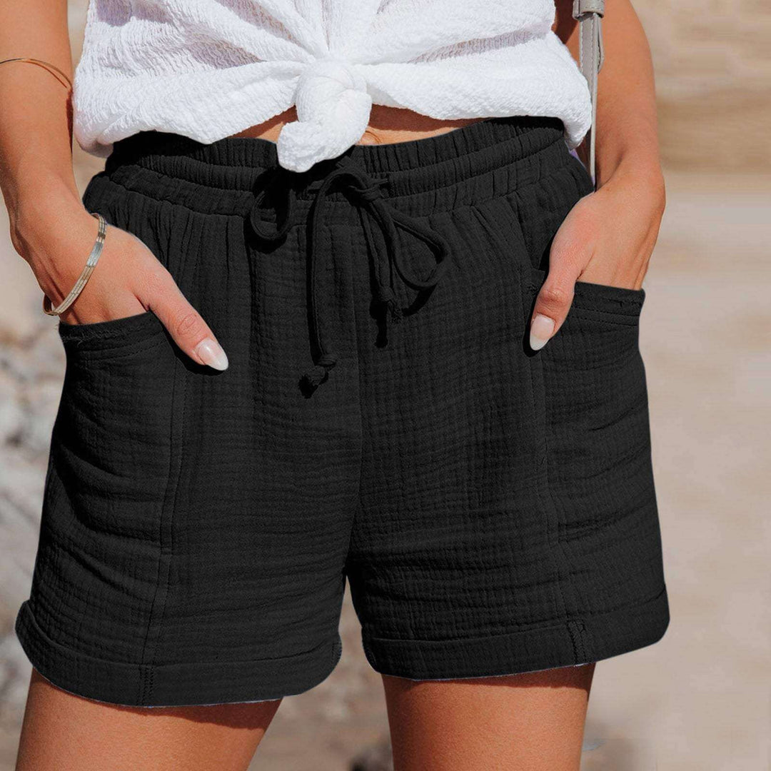 Green women's relaxed fit casual shorts. Comfortable drawstring, ideal for summer lounge & active wear.