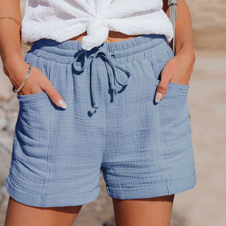 Stylish black women's relaxed fit shorts. Versatile casual everyday wear with elastic waist for comfort.