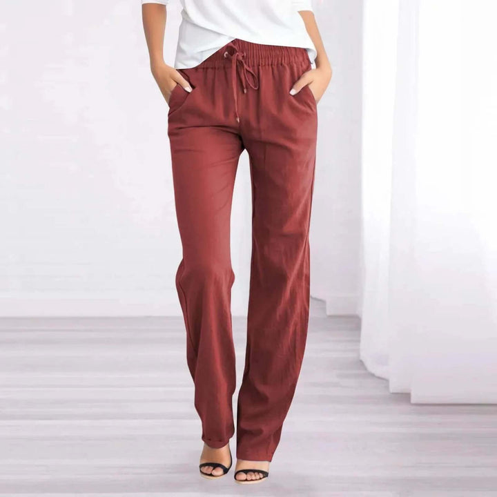 Solid color women's relaxed fit trousers, pull-on style, comfortable straight leg for versatile everyday fashion.