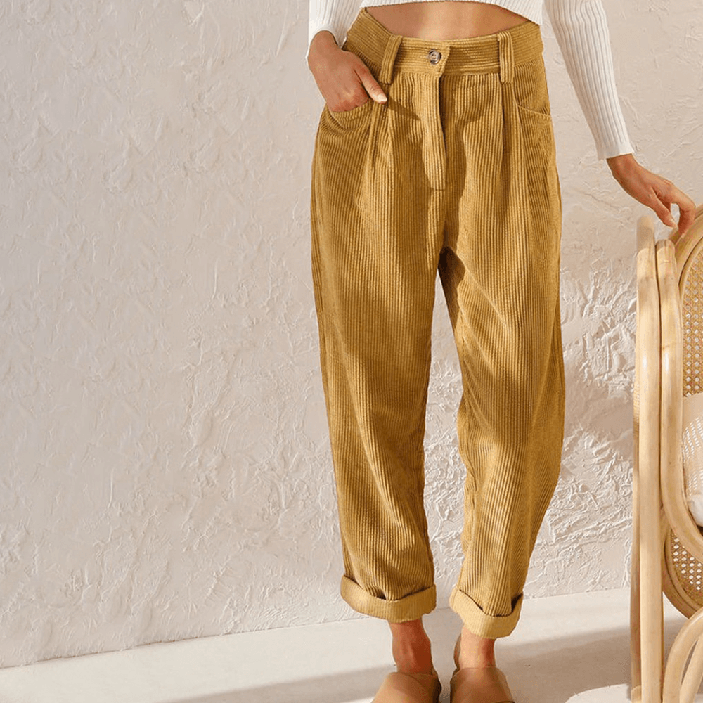 Model wearing relaxed fit corduroy trousers, perfect for comfortable women's casual wear & autumn fashion.