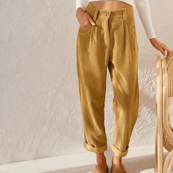 Model wearing relaxed fit corduroy trousers, perfect for comfortable women's casual wear & autumn fashion.