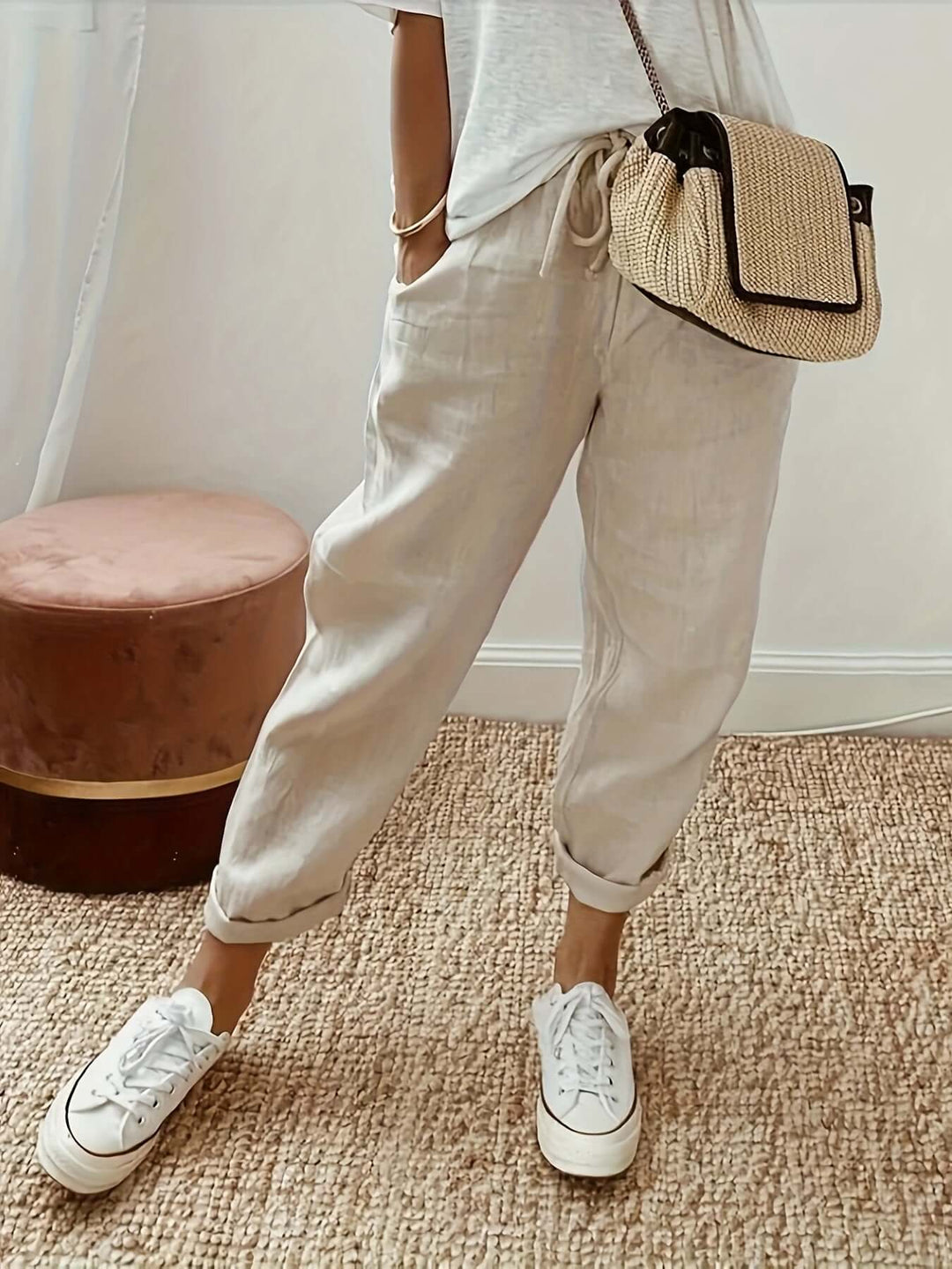 Women's relaxed fit cotton joggers with adjustable drawstring waist and cuffed ankles, perfect for casual comfort.