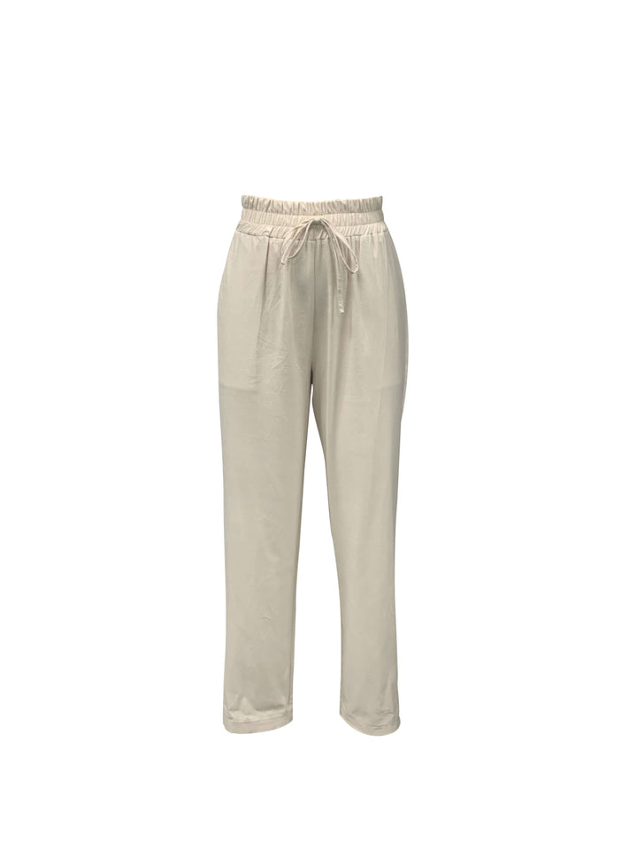 Comfortable women's cotton joggers, relaxed fit with drawstring & cuffs, versatile for everyday casual style.