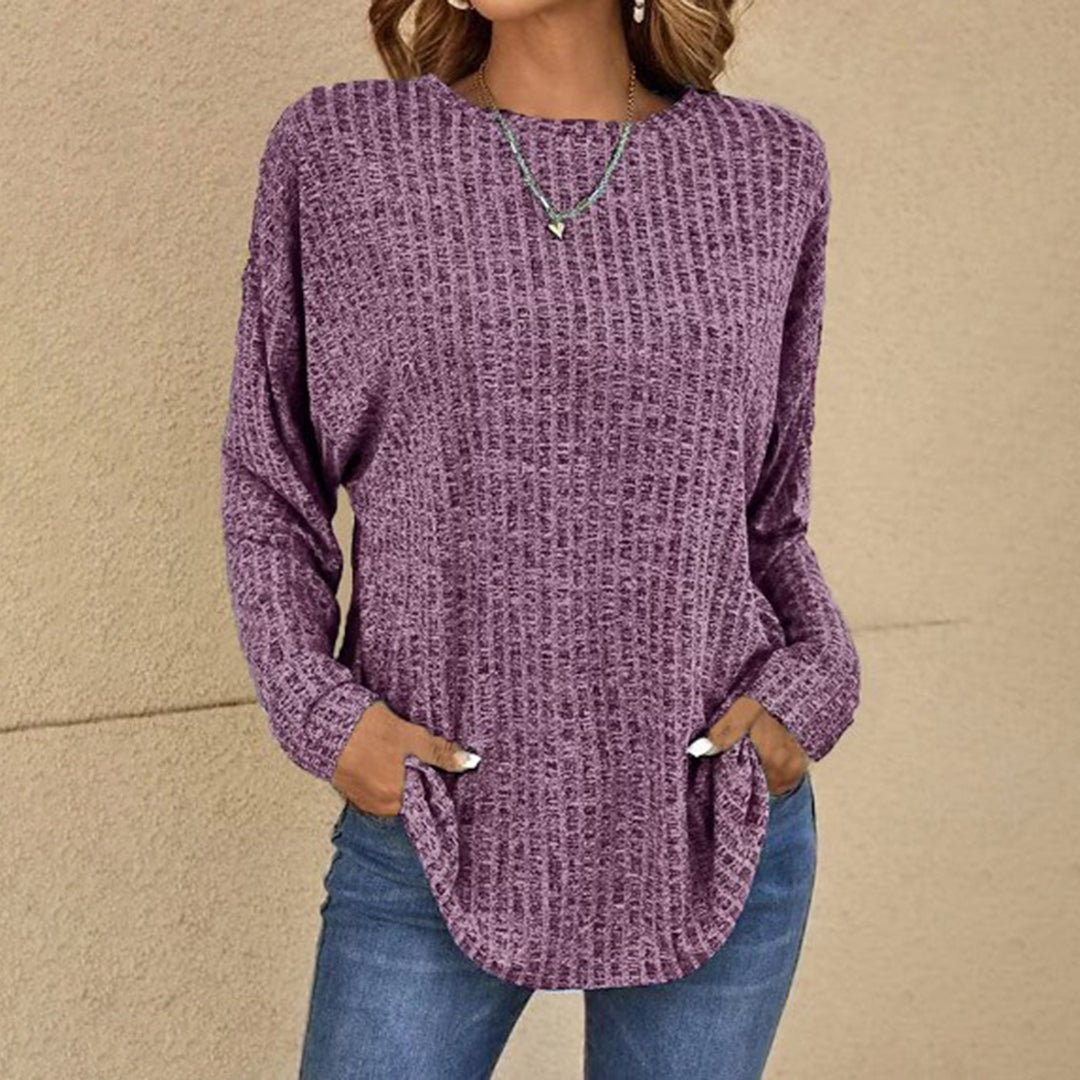 Women's full view of a relaxed fit long sleeve crew neck jumper, perfect for cozy autumn-winter layering.