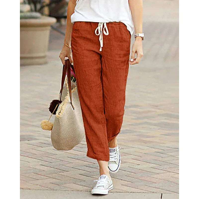 Comfortable women's relaxed fit cropped trousers with adjustable drawstring, great for everyday wear.