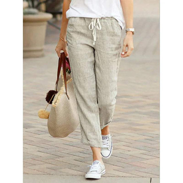 Closeup of women's relaxed fit cropped drawstring trousers, highlighting fabric and comfort.