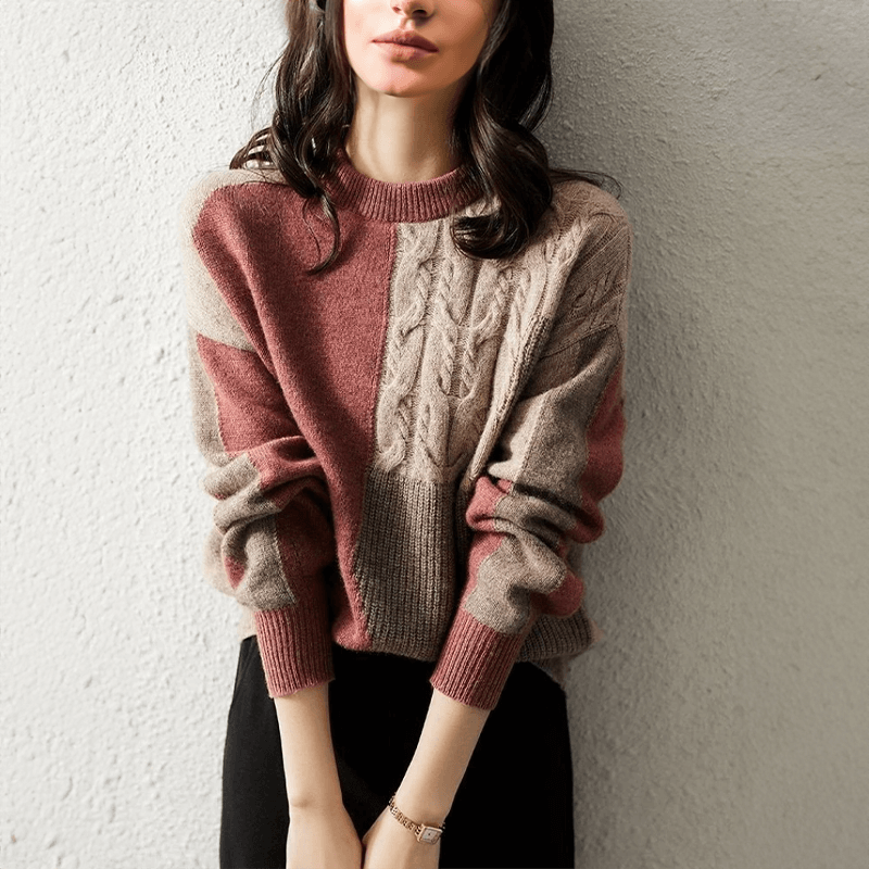 Women's relaxed fit hip-length pullover sweater. Comfortable & versatile for casual fall/spring style.