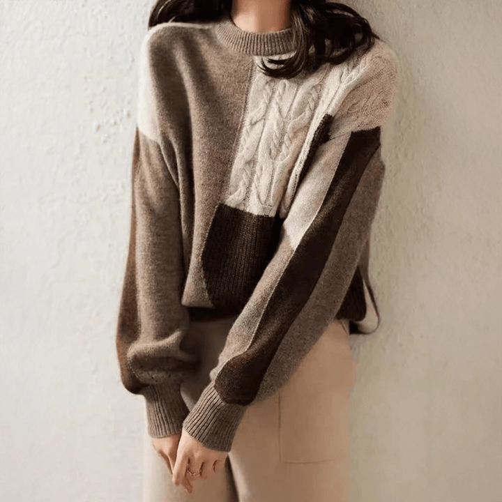 Versatile women's casual hip-length pullover sweater. Relaxed fit long-sleeve top for everyday comfort.