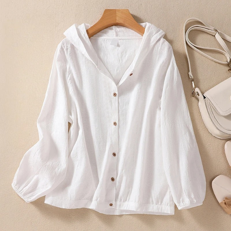Women's relaxed fit hooded shirt in a comfortable fabric, perfect for everyday casual elegance.