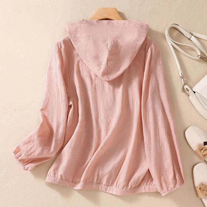Casual elegant women's long sleeve hooded shirt, offering a relaxed fit for comfortable, stylish wear.