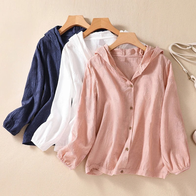 Soft pullover women's relaxed fit hooded shirt, a comfortable and stylish long sleeve top for everyday fashion.