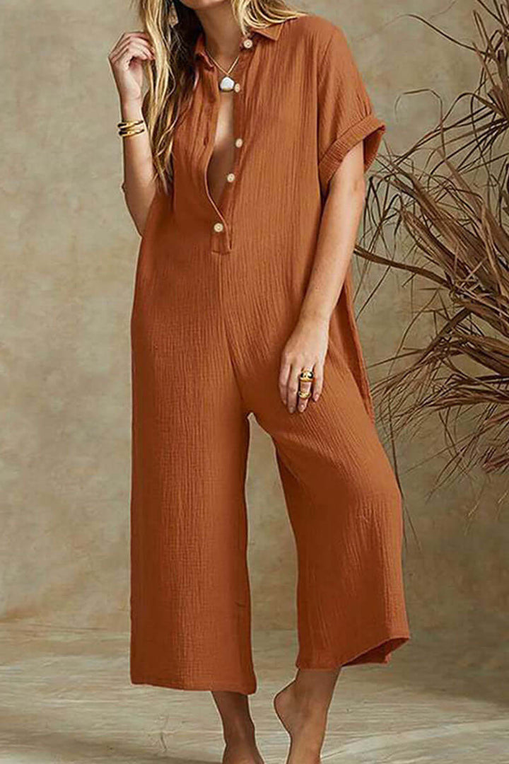 Elegant women's relaxed jumpsuit, notch collar, full-length, offering versatile and comfortable eco-friendly fashion.