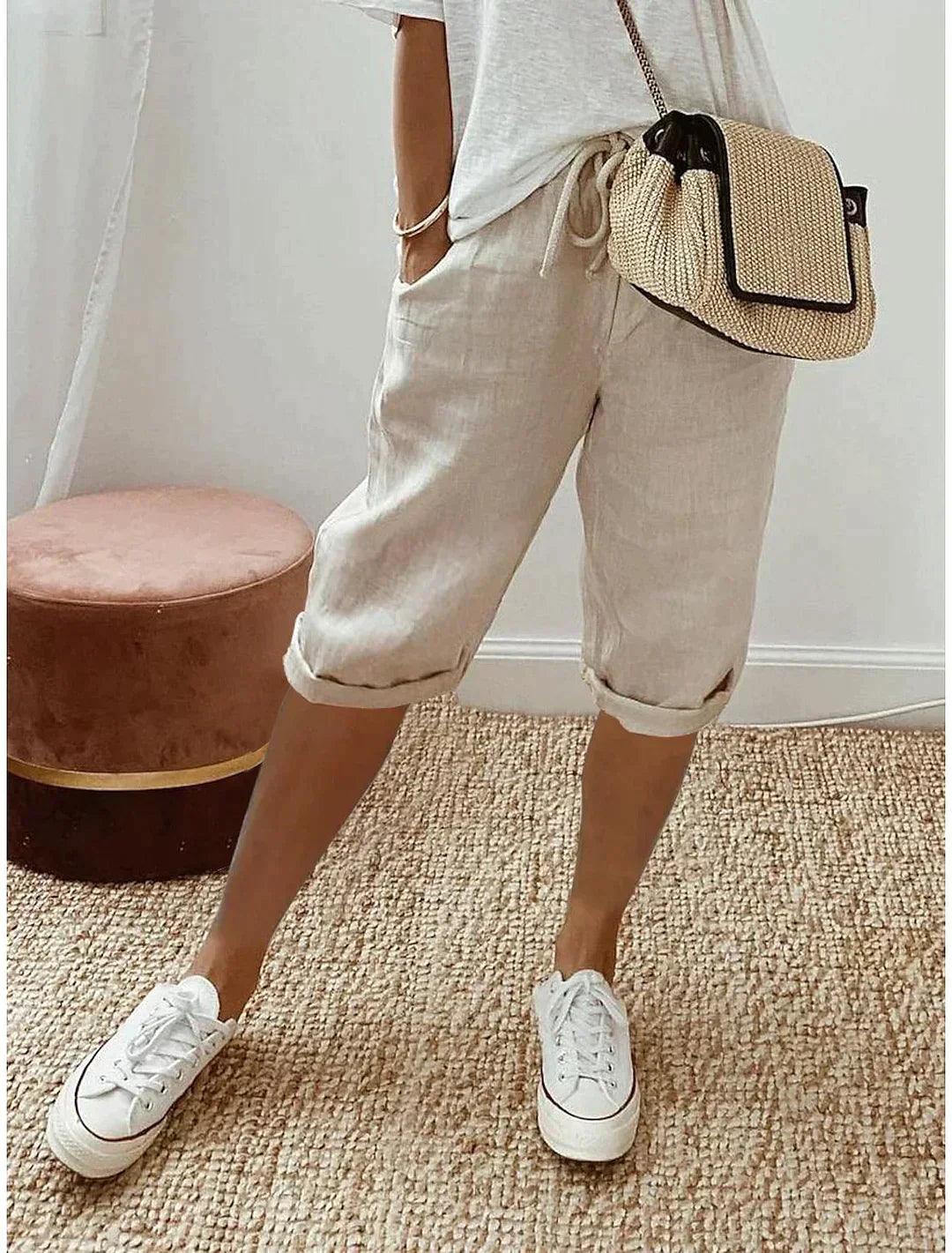Women's relaxed fit linen capri pants. Comfortable & breathable for summer casual wear and everyday style.