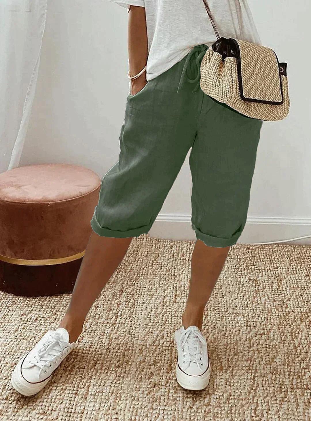 Detailed view of women's comfortable linen capri pants, highlighting soft, breathable fabric & stretch waist.